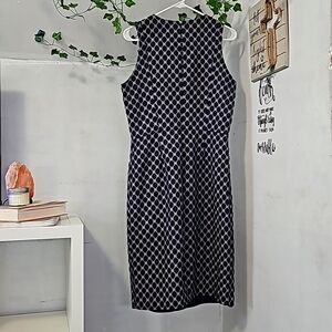 A maxi dress. Color navy blue and  cream.